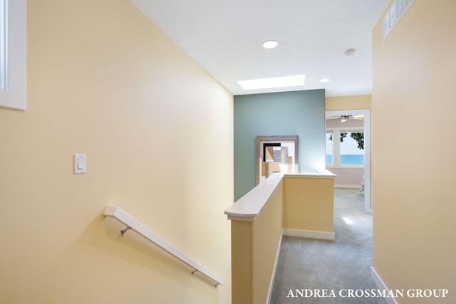 1228 Shore Crest Dr, South Haven, MI 49090 - hallway with an upstairs landing, carpet flooring, and recessed lighting