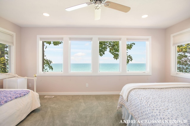 1228 Shore Crest Dr, South Haven, MI 49090 - bedroom featuring carpet flooring, a water view, recessed lighting, and ceiling fan