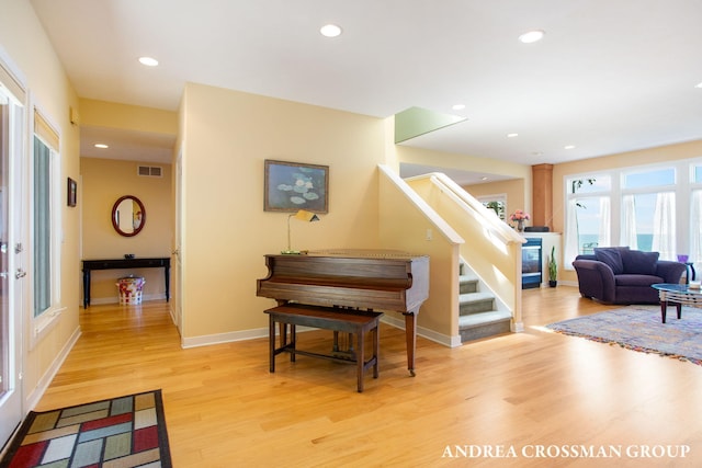 1228 Shore Crest Dr, South Haven, MI 49090 - entryway featuring wood finished floors, stairway, and recessed lighting