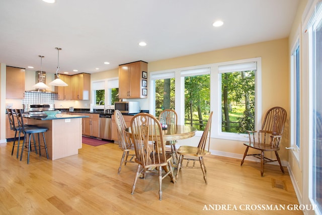 1228 Shore Crest Dr, South Haven, MI 49090 - dining area featuring light wood-style flooring and recessed lighting