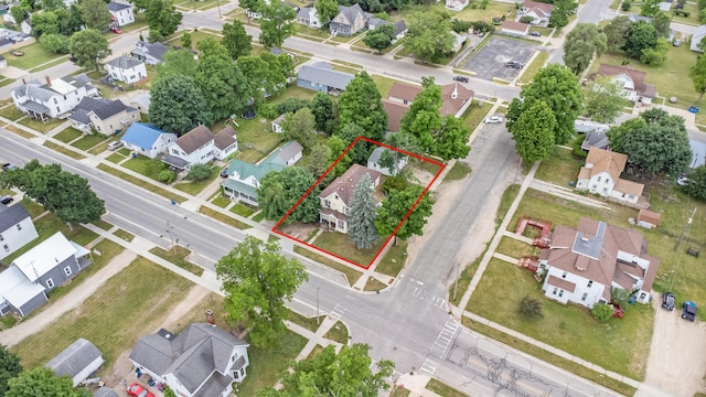 405 5th St, Evart, MI 49631 - aerial view of residential area with property boundaries highlighted