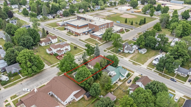405 5th St, Evart, MI 49631 - aerial perspective of suburban area featuring property boundaries highlighted