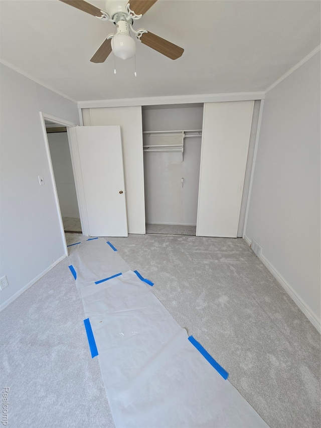 15335 Mccann St, Southgate, MI 48195 - unfurnished bedroom featuring carpet floors, a closet, and a ceiling fan