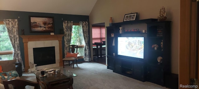 15203 Woodpine Dr, Monroe, MI 48161 - carpeted living area with vaulted ceiling and a tile fireplace