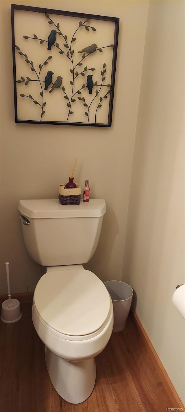15203 Woodpine Dr, Monroe, MI 48161 - bathroom featuring baseboards and wood finished floors