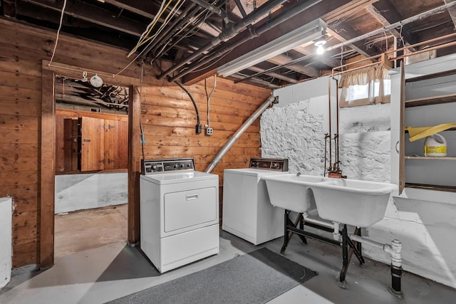 715 Ellery Ave, Jackson, MI 49202 - washroom featuring washing machine and dryer and wooden walls