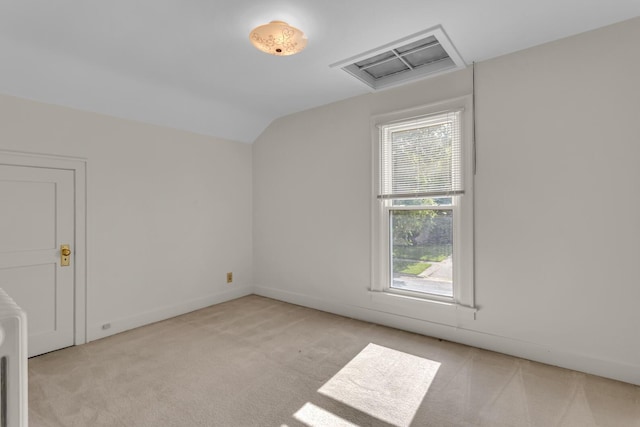 715 Ellery Ave, Jackson, MI 49202 - bonus room featuring carpet, lofted ceiling, and attic access