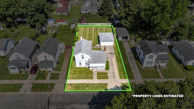 715 Ellery Ave, Jackson, MI 49202 - aerial perspective of suburban area featuring property boundaries highlighted