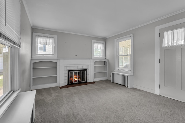 715 Ellery Ave, Jackson, MI 49202 - unfurnished living room with radiator, ornamental molding, plenty of natural light, and carpet flooring