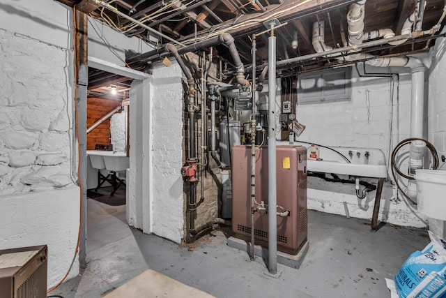 715 Ellery Ave, Jackson, MI 49202 - unfinished below grade area with a sink and a heating unit
