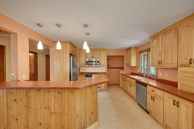 99 Tahoma Trl, New Buffalo, MI 49117 - kitchen with appliances with stainless steel finishes, light brown cabinets, a peninsula, a kitchen bar, and light tile patterned floors