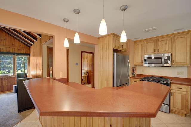 99 Tahoma Trl, New Buffalo, MI 49117 - kitchen featuring stainless steel appliances, light brown cabinetry, tasteful backsplash, and light tile patterned floors