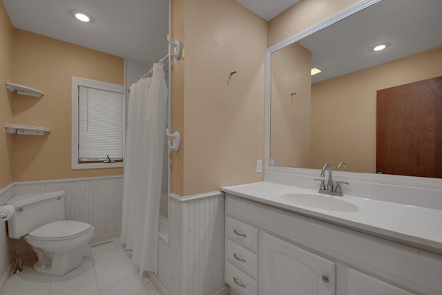 99 Tahoma Trl, New Buffalo, MI 49117 - full bath featuring wainscoting, vanity, tile patterned floors, and a shower with curtain