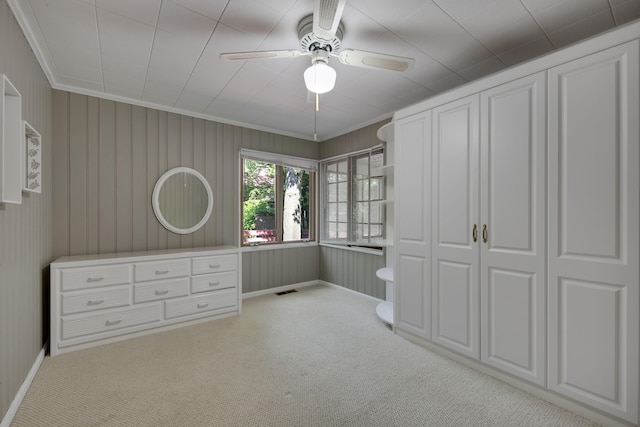 99 Tahoma Trl, New Buffalo, MI 49117 - unfurnished bedroom with ornamental molding, carpet, and ceiling fan