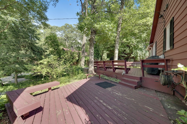 99 Tahoma Trl, New Buffalo, MI 49117 - wooden deck featuring view of scattered trees and grilling area