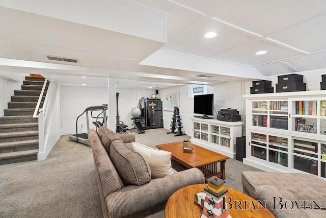 2625 Elmwood Dr, Pierson, MI 49339 - living area featuring carpet flooring, stairway, and recessed lighting