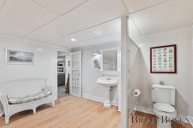 2625 Elmwood Dr, Pierson, MI 49339 - bathroom with wood finished floors, crown molding, french doors, and recessed lighting