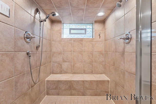 2625 Elmwood Dr, Pierson, MI 49339 - bathroom featuring a tile shower and recessed lighting