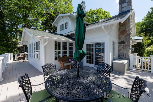 2625 Elmwood Dr, Pierson, MI 49339 - wooden terrace with outdoor dining space
