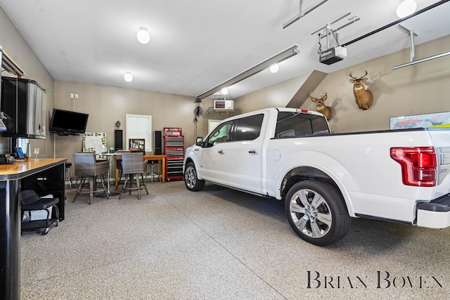 2625 Elmwood Dr, Pierson, MI 49339 - garage with a garage door opener