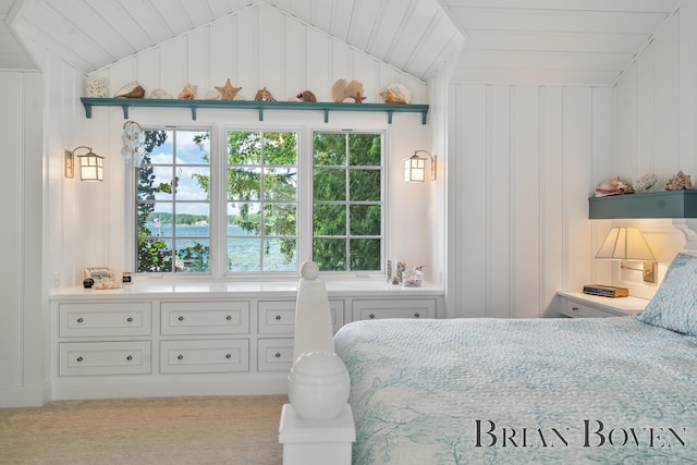 2625 Elmwood Dr, Pierson, MI 49339 - carpeted bedroom featuring vaulted ceiling