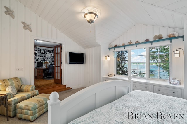 2625 Elmwood Dr, Pierson, MI 49339 - carpeted bedroom featuring vaulted ceiling, a desk, and a walk in closet