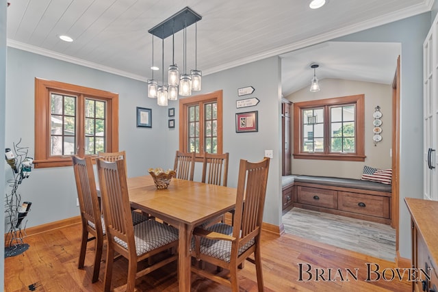 2625 Elmwood Dr, Pierson, MI 49339 - dining area featuring light wood finished floors, recessed lighting, ornamental molding, and a chandelier