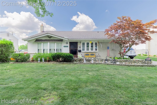 36827 Weideman, Clinton Township, MI 48035 - ranch-style house featuring a front yard, a chimney, and brick siding