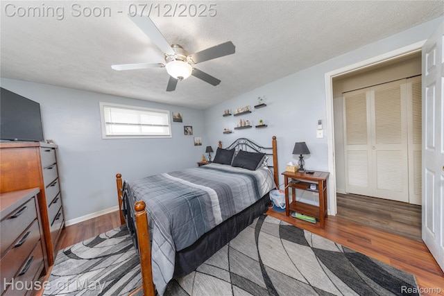 36827 Weideman, Clinton Township, MI 48035 - bedroom featuring wood finished floors, ceiling fan, and a textured ceiling