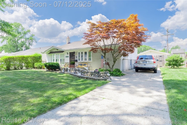 36827 Weideman, Clinton Township, MI 48035 - ranch-style house with a detached carport, a front yard, concrete driveway, and a chimney