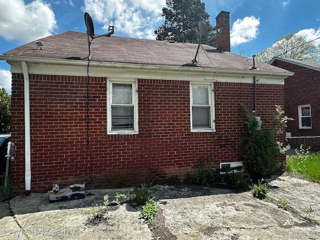 19505 Sunderland Rd, Detroit, MI 48219 - view of property exterior with brick siding and a shingled roof