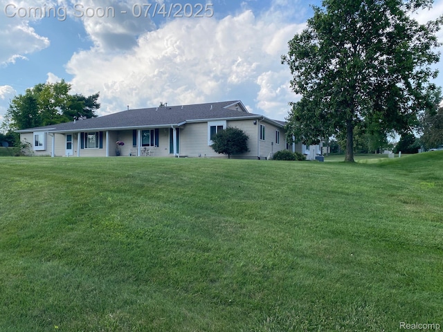 1093 Lake Park Cir Unit 6, Grand Blanc, MI 48439 - ranch-style house featuring a front lawn