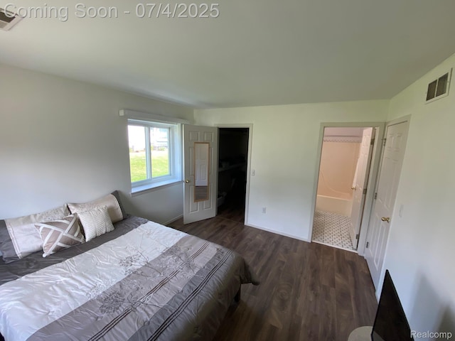 1093 Lake Park Cir Unit 6, Grand Blanc, MI 48439 - bedroom featuring dark wood finished floors and baseboards