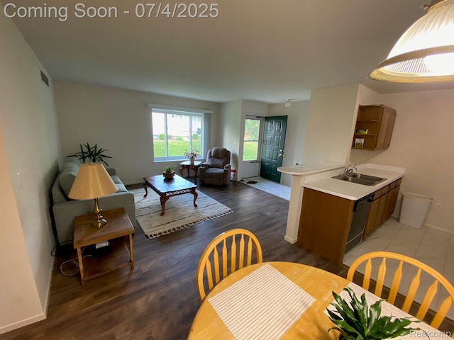 1093 Lake Park Cir Unit 6, Grand Blanc, MI 48439 - dining space with light wood-type flooring and baseboards