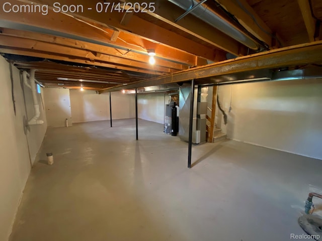 1093 Lake Park Cir Unit 6, Grand Blanc, MI 48439 - unfinished basement featuring heating unit, stairway, and water heater