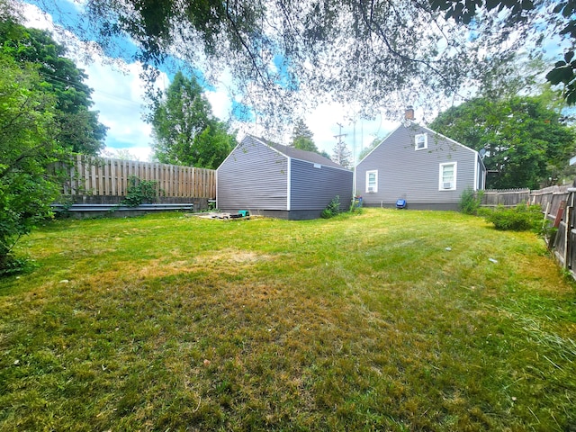 2258 Mckee Ave SW, Grand Rapids, MI 49503 - fenced backyard featuring an outdoor structure
