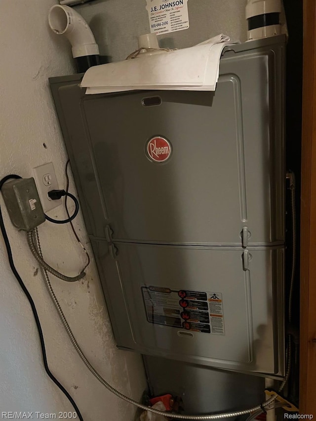 755 S Hale Rd, Twining, MI 48766 - utility room featuring water heater