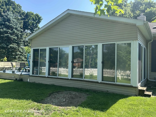 324 Pine St, Clio, MI 48420 - view of property exterior with a chimney and a lawn