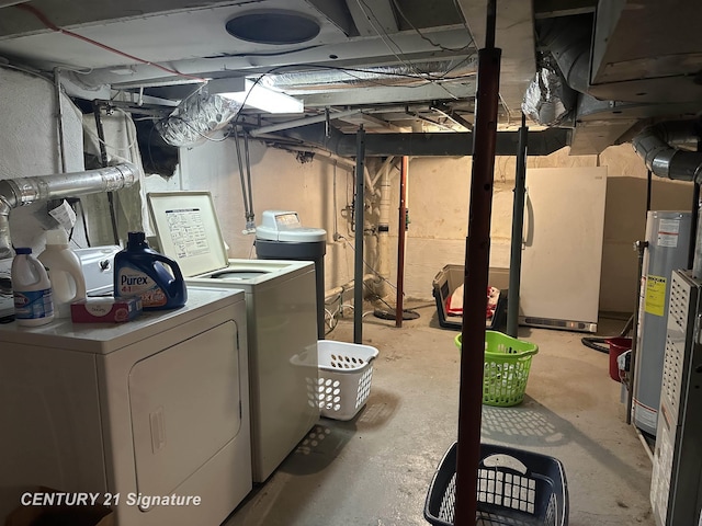 324 Pine St, Clio, MI 48420 - unfinished below grade area with independent washer and dryer and gas water heater
