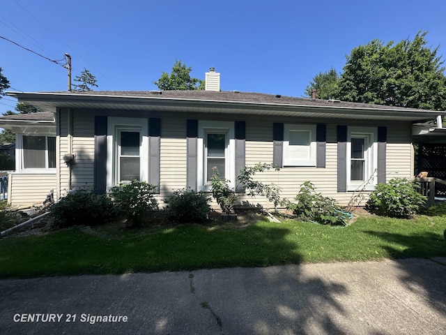 324 Pine St, Clio, MI 48420 - view of front of home featuring a chimney