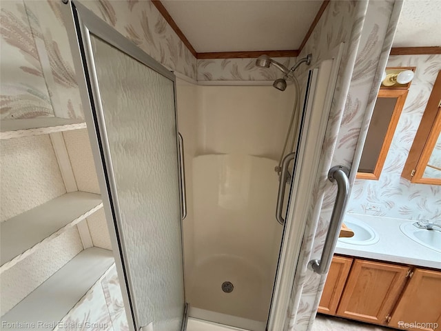 26852 Roric St, Novi, MI 48377 - bathroom featuring a shower stall, vanity, and wallpapered walls