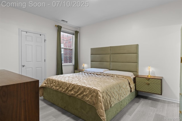 8461 Towne Center Cir N, Warren, MI 48093 - bedroom with wood finished floors