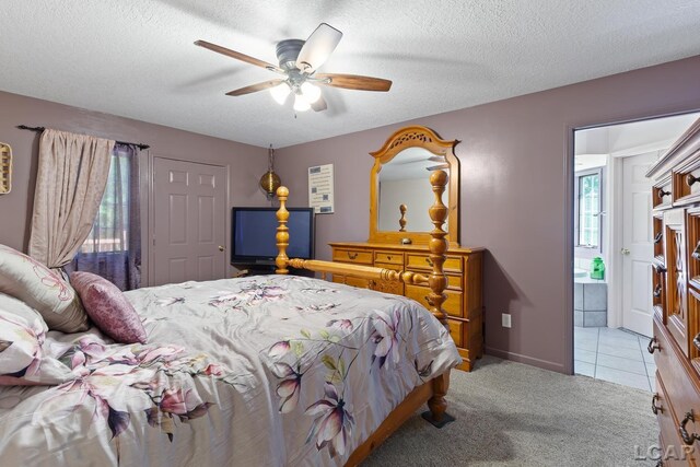 15858 Lelah Ln, Addison, MI 49220 - tiled bedroom featuring a textured ceiling, carpet floors, and a ceiling fan