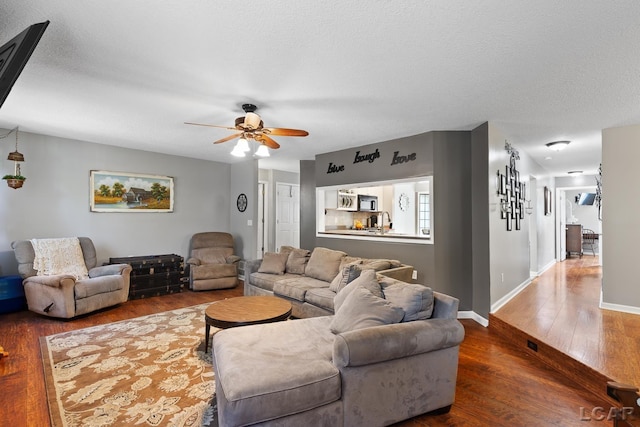 15858 Lelah Ln, Addison, MI 49220 - living area with wood finished floors and ceiling fan