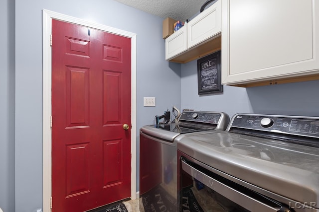 15858 Lelah Ln, Addison, MI 49220 - laundry room with cabinet space, independent washer and dryer, and a textured ceiling