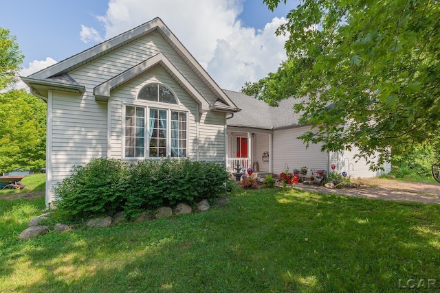 15858 Lelah Ln, Addison, MI 49220 - single story home featuring a front yard and a garage