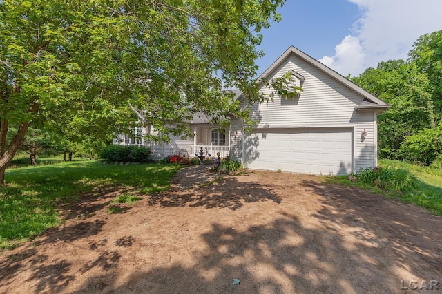 15858 Lelah Ln, Addison, MI 49220 - view of front of house featuring driveway and an attached garage