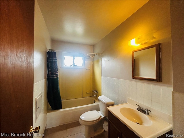 3948 10th St, Ecorse, MI 48229 - full bathroom featuring tile walls, shower / tub combo with curtain, vanity, tile patterned floors, and wainscoting