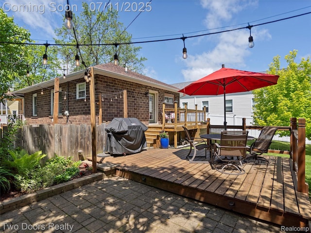 30 Beebe St, Lake Orion, MI 48362 - deck with outdoor dining area and a grill