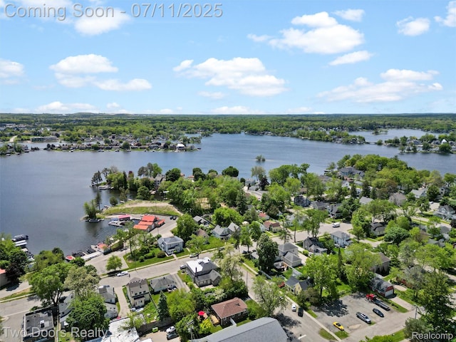 30 Beebe St, Lake Orion, MI 48362 - aerial perspective of suburban area featuring a nearby body of water